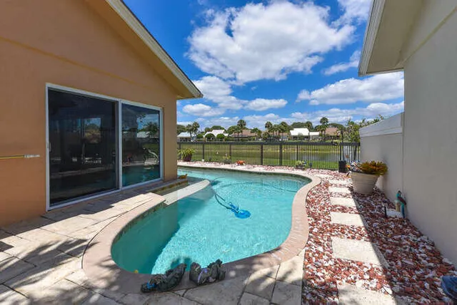a view of a porch with potted plants