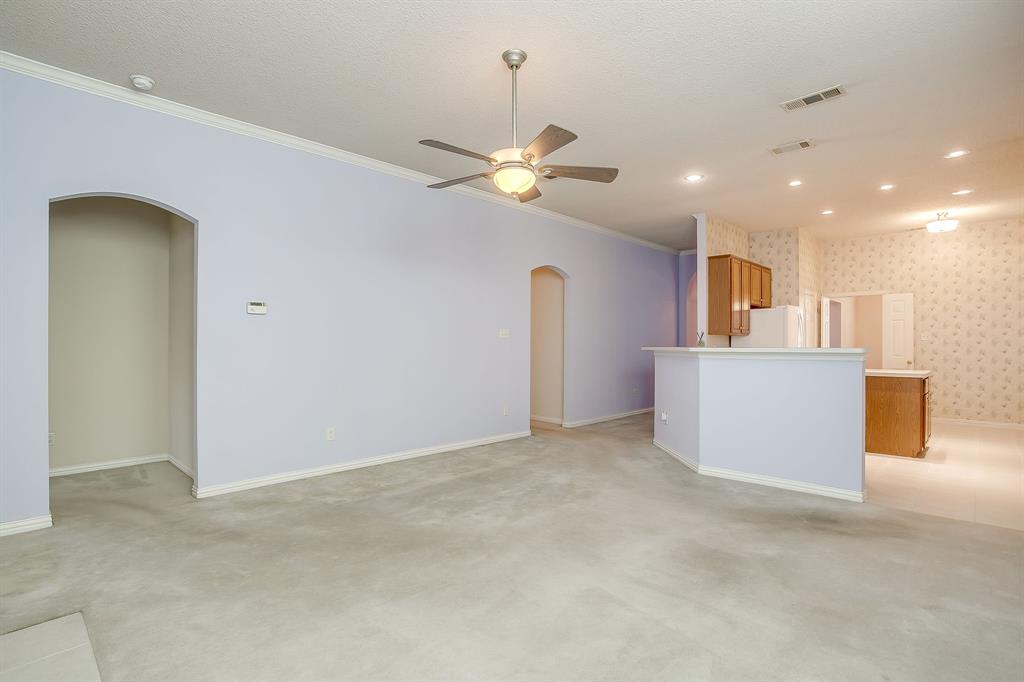 8105 Hosta Way Fort Worth, TX 76123 - Photo 12 of 33 a view of a livingroom with a kitchen