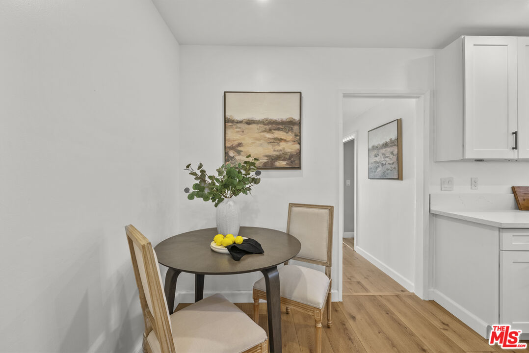 746 Valley View Avenue Monrovia, CA 91016 - Photo 16 of 53 a dining room with furniture and wooden floor