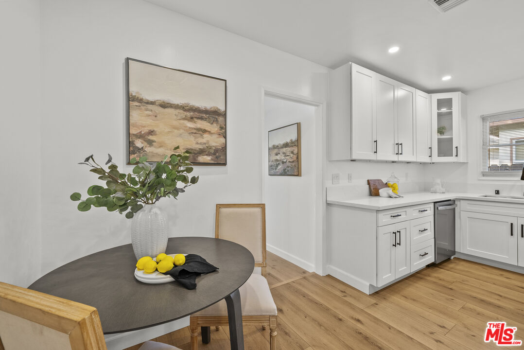 746 Valley View Avenue Monrovia, CA 91016 - Photo 17 of 53 a kitchen with a sink potted plant and cabinets