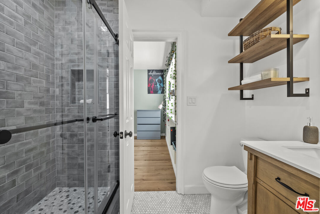 746 Valley View Avenue Monrovia, CA 91016 - Photo 22 of 53 a bathroom with a sink a toilet and shower