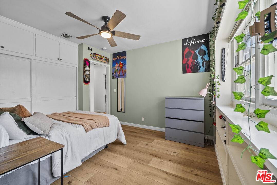 746 Valley View Avenue Monrovia, CA 91016 - Photo 25 of 53 a bedroom with bed and wooden floor