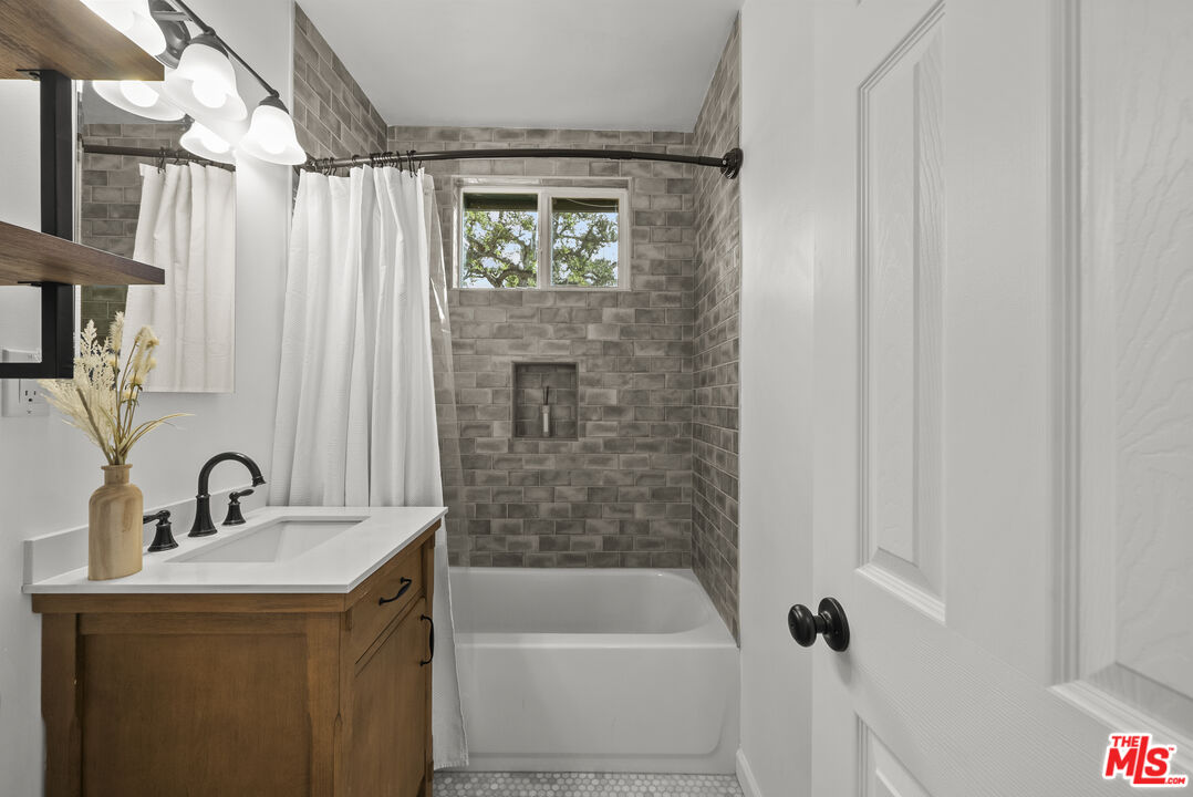746 Valley View Avenue Monrovia, CA 91016 - Photo 28 of 53 a bathroom with a sink and a shower