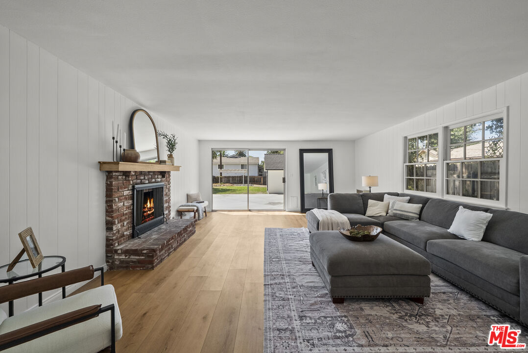 746 Valley View Avenue Monrovia, CA 91016 - Photo 31 of 53 a living room with furniture and a fireplace