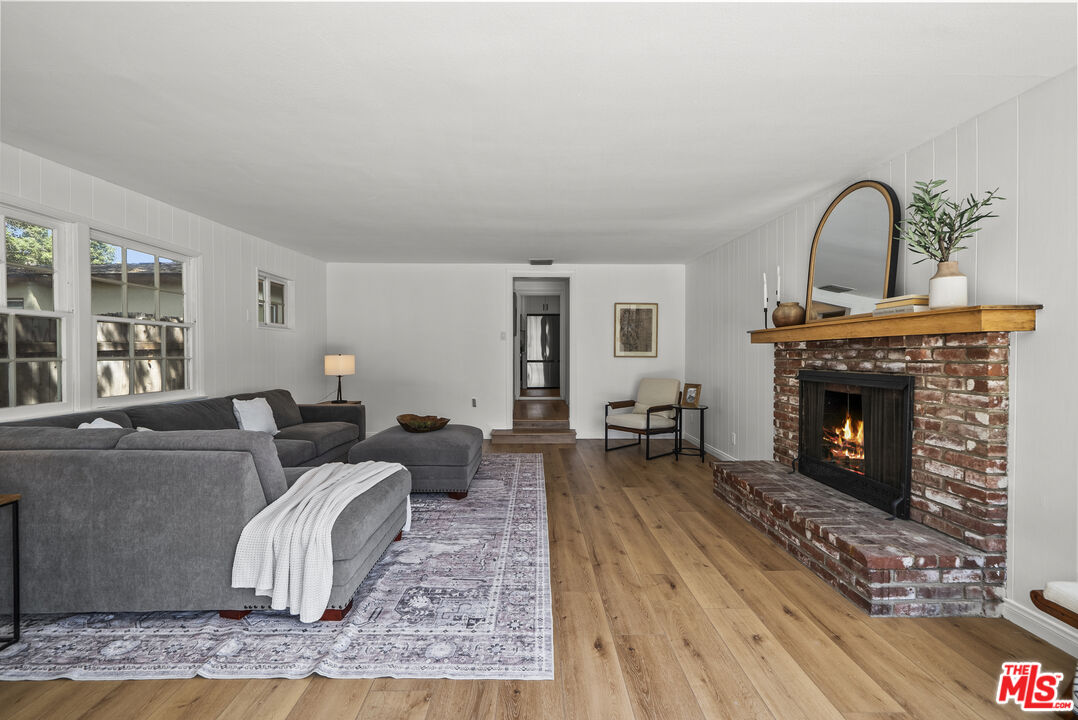 746 Valley View Avenue Monrovia, CA 91016 - Photo 34 of 53 a living room with furniture and a fireplace