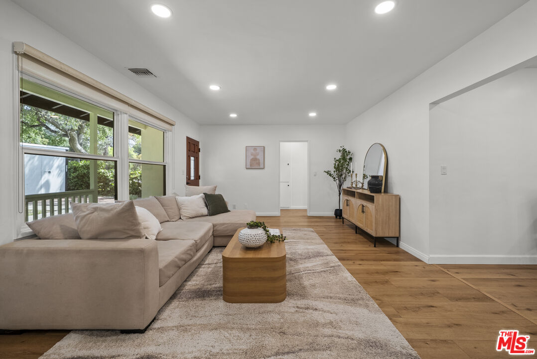 746 Valley View Avenue Monrovia, CA 91016 - Photo 4 of 53 a living room with furniture and a large window