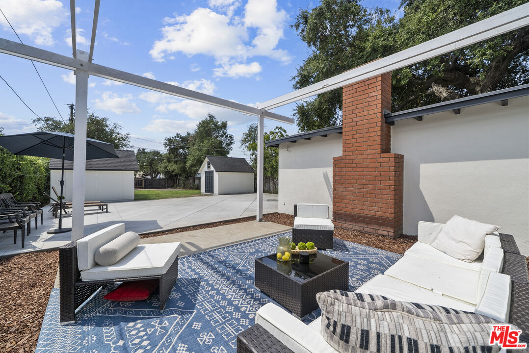 746 Valley View Avenue Monrovia, CA 91016 - Photo 45 of 53 a view of a patio with couches table and chairs and potted plants