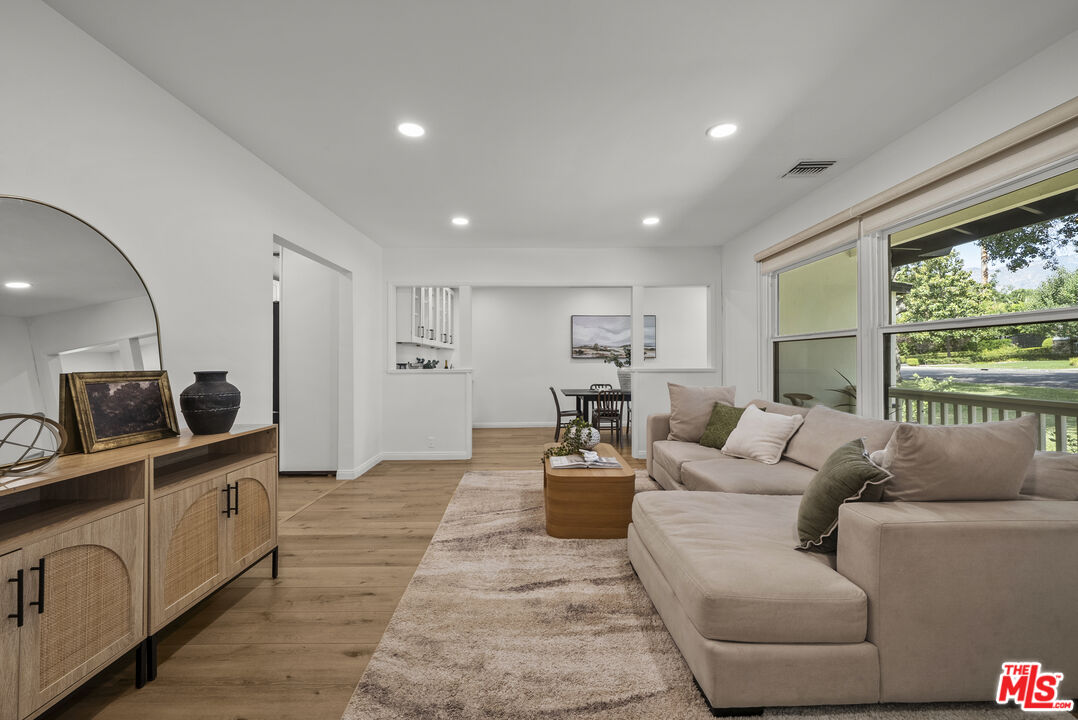 746 Valley View Avenue Monrovia, CA 91016 - Photo 5 of 53 a living room with furniture and a flat screen tv