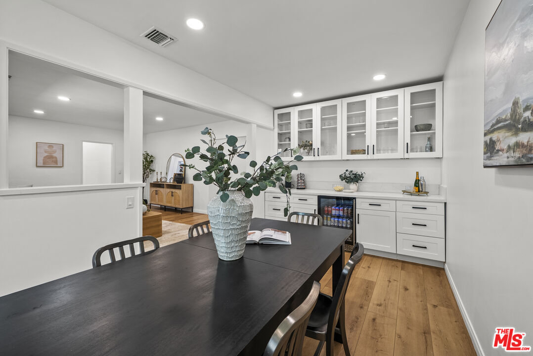 746 Valley View Avenue Monrovia, CA 91016 - Photo 10 of 53 a dining room with furniture and wooden floor