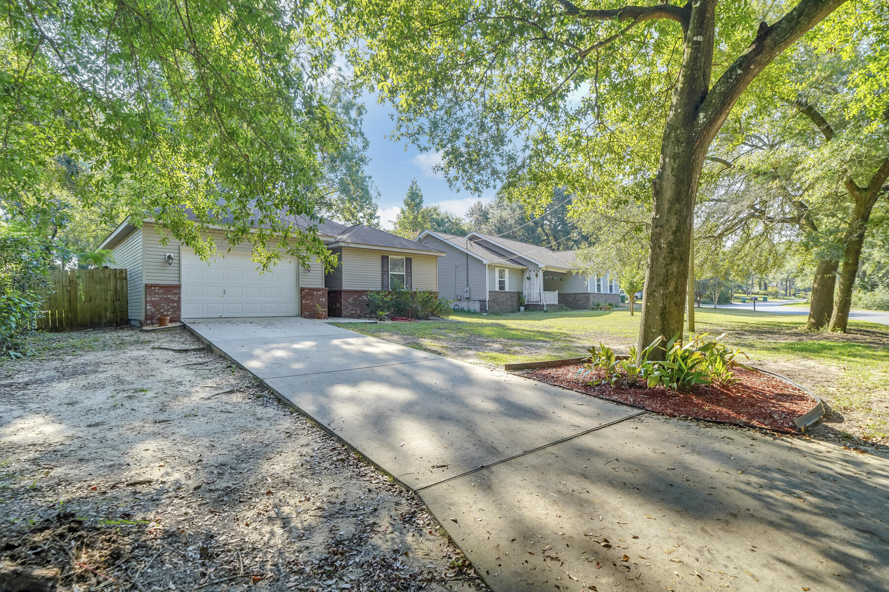 1705 North Pearl Street Crestview, FL 32536 - Photo 2 of 23 a view of house with yard