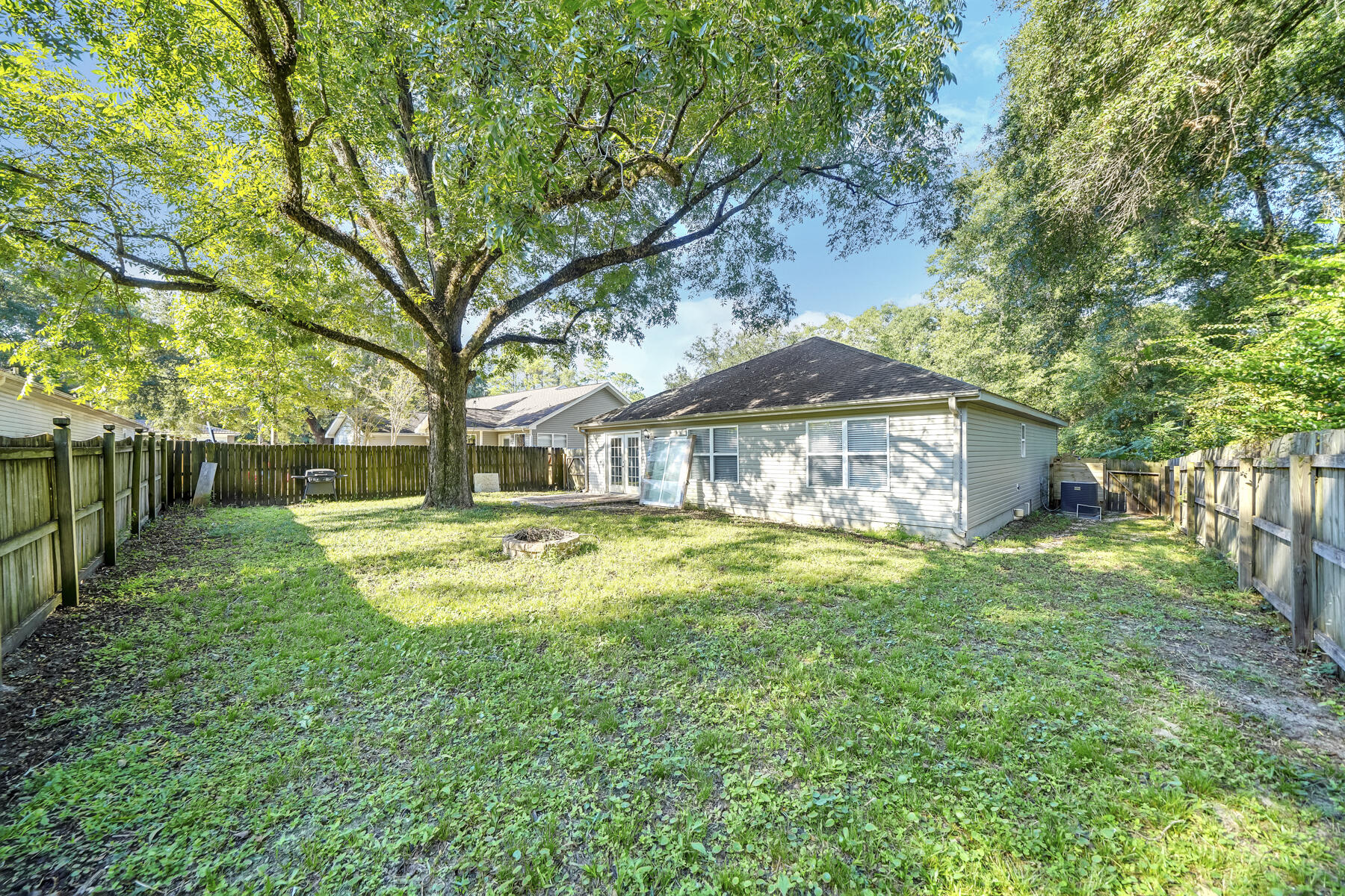 1705 North Pearl Street Crestview, FL 32536 - Photo 22 of 23 a view of a house with a yard