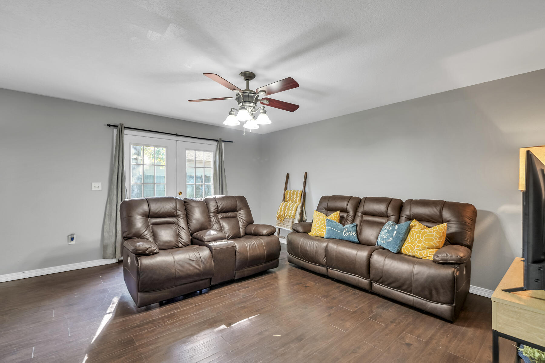 1705 North Pearl Street Crestview, FL 32536 - Photo 6 of 23 a living room with furniture and a couch