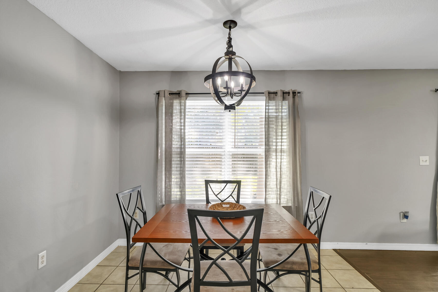 1705 North Pearl Street Crestview, FL 32536 - Photo 7 of 23 a view of a dining room with furniture window and wooden floor