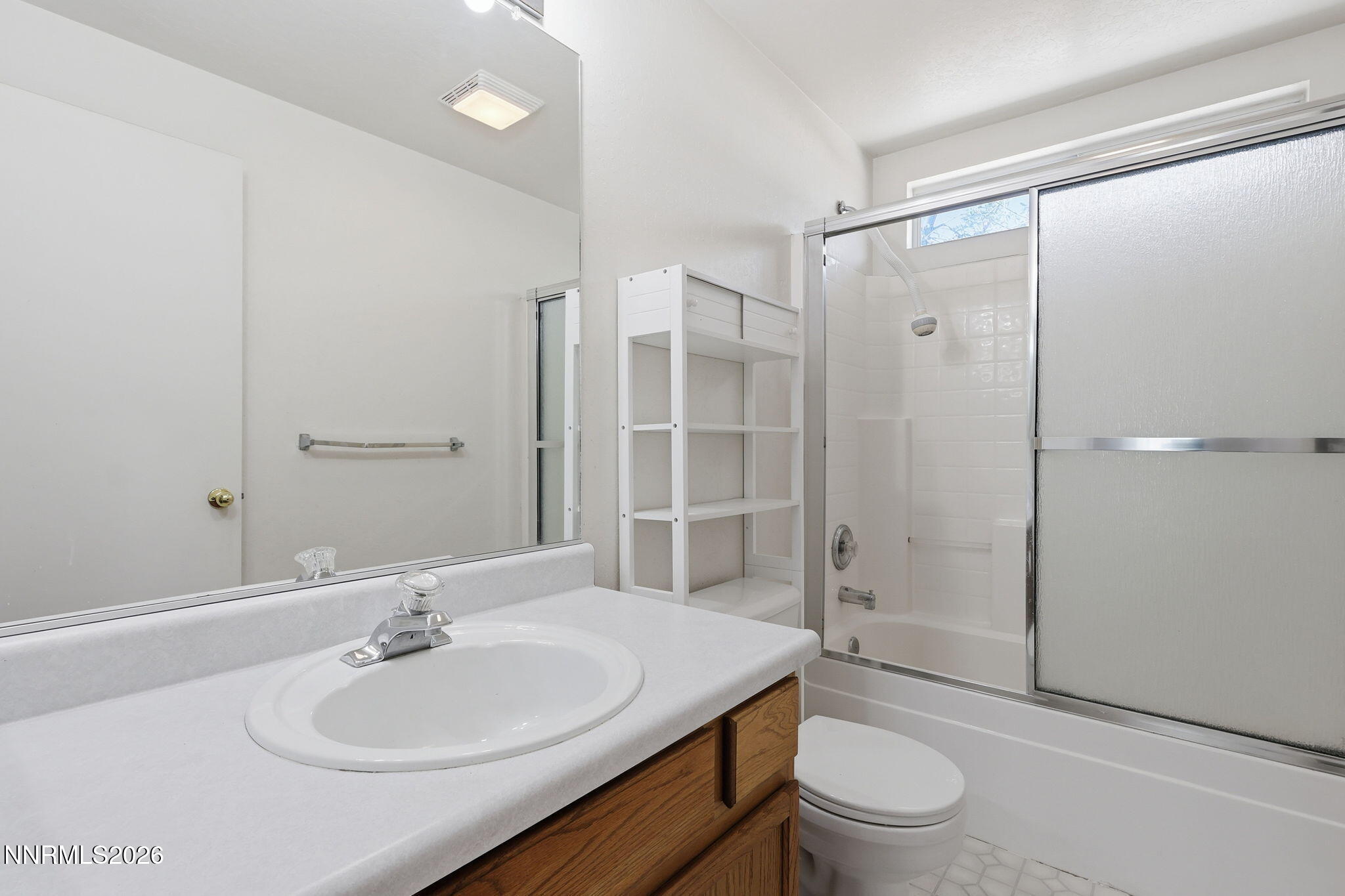 6840 Viscaya Court Reno, NV 89523 - Photo 22 of 25 a bathroom with a sink toilet and shower