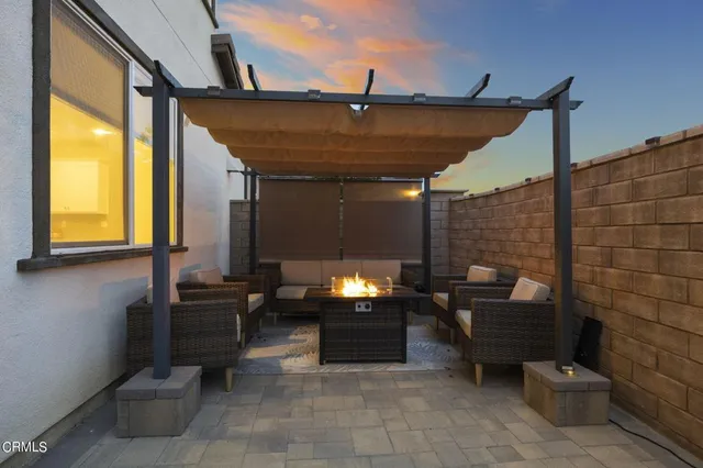 a outdoor space with patio furniture and a potted plant