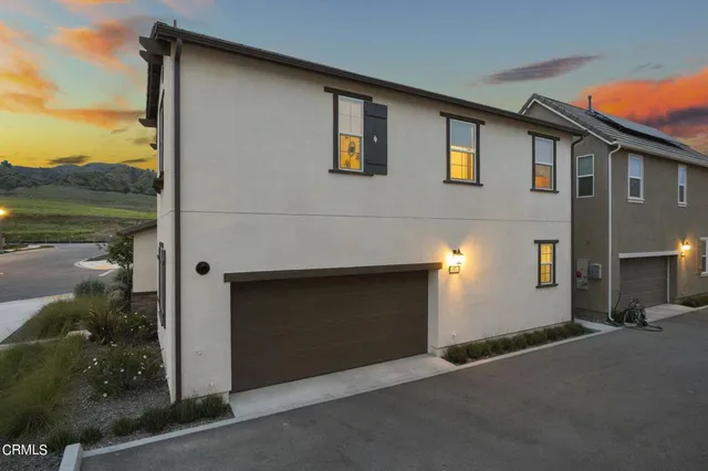 a house view with a outdoor space