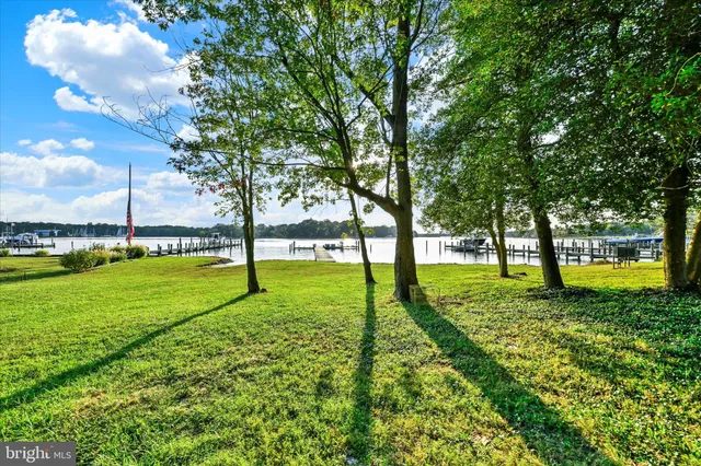 a view of an house with a yard