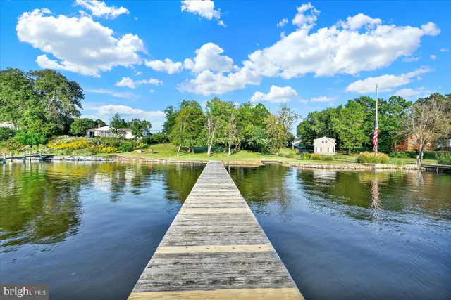 a view of wooden floor with a lake