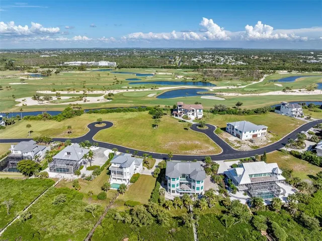 a view of a city with an ocean view