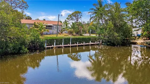 a view of a lake with houses