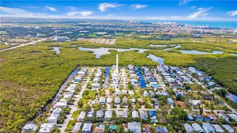 a view of a city with an ocean view