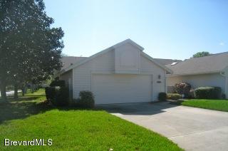 827 Ridge Lake Drive Melbourne, FL 32940 - Photo 2 of 23 Side View.jpeg