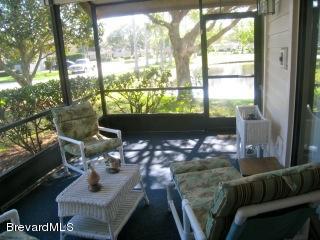 827 Ridge Lake Drive Melbourne, FL 32940 - Photo 12 of 23 Screened Back Porch.jpeg