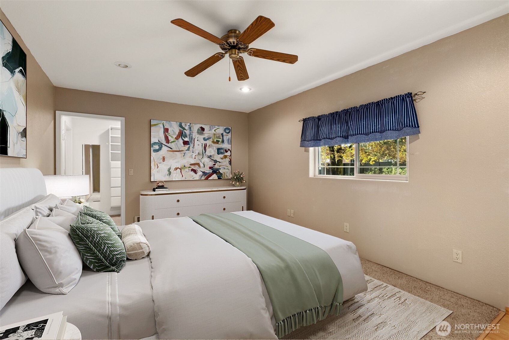 998 SR 6 Raymond, WA 98577 - Photo 14 of 38 a bedroom with a large bed and a window