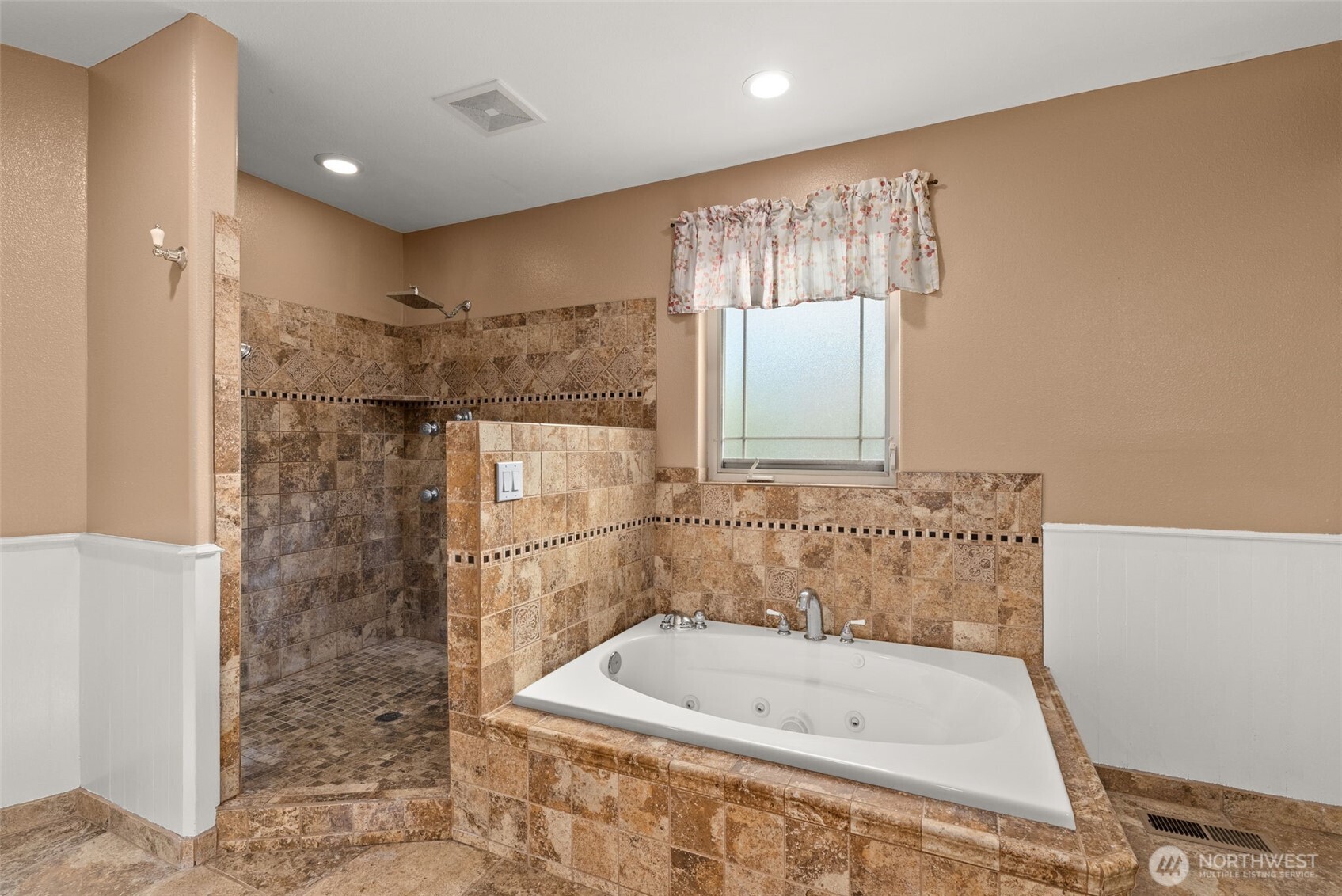 998 SR 6 Raymond, WA 98577 - Photo 17 of 40 a bathroom with a bathtub and a shower