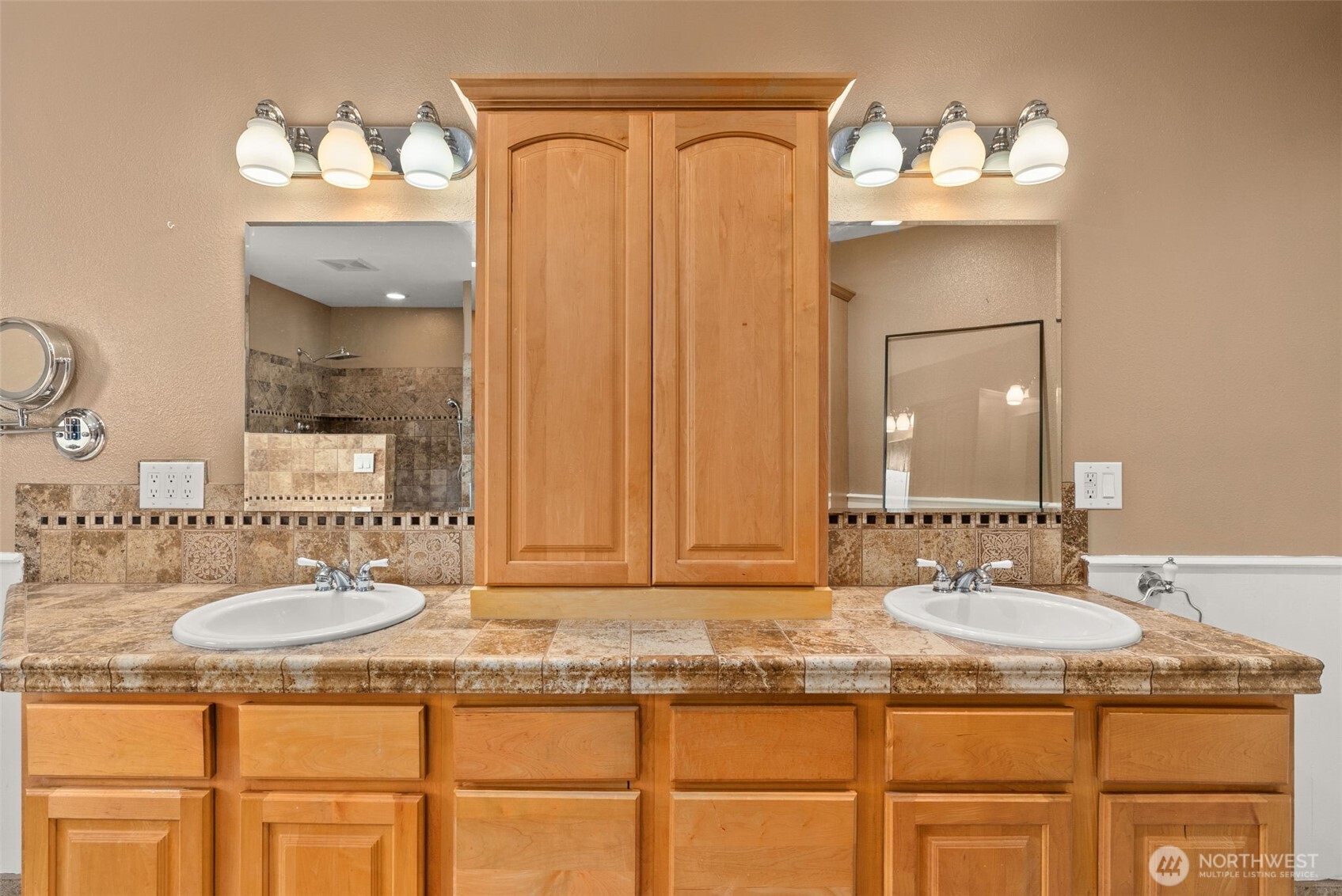 998 SR 6 Raymond, WA 98577 - Photo 18 of 38 a bathroom with a sink vanity and a mirror