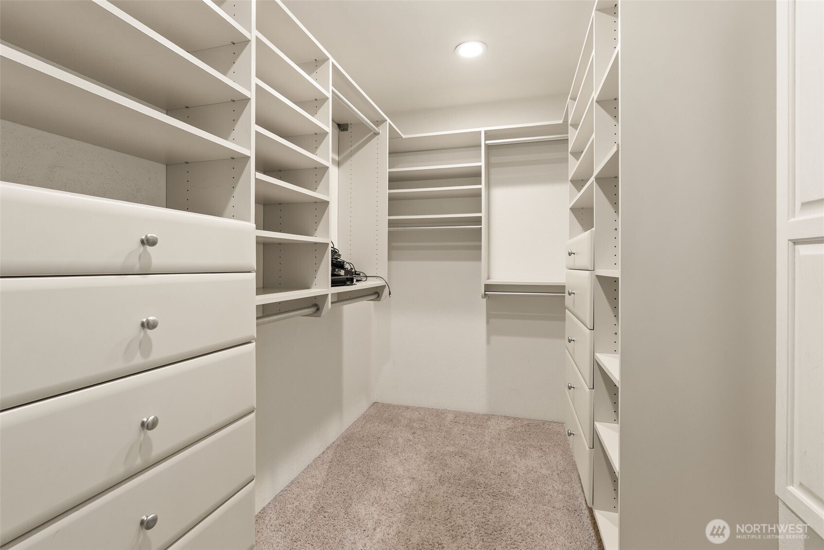 998 SR 6 Raymond, WA 98577 - Photo 20 of 38 a view of walk in closet with empty racks