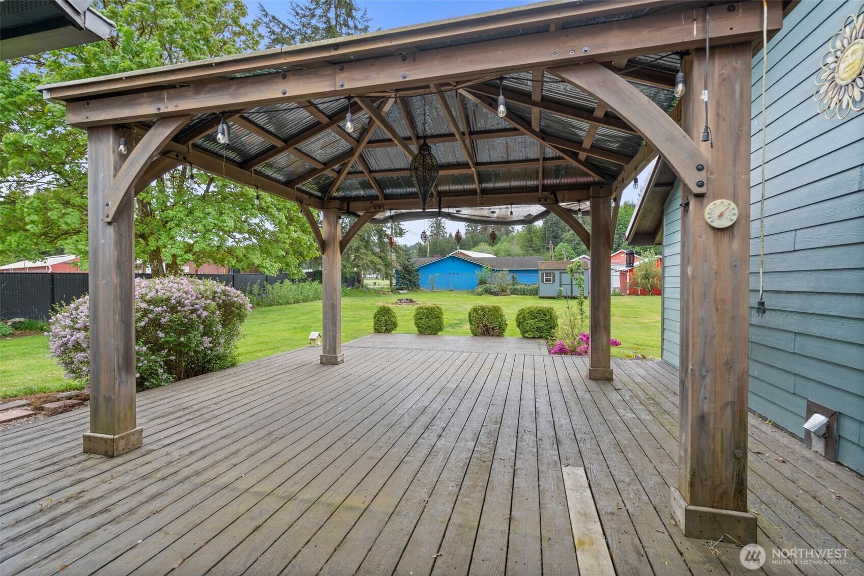 998 SR 6 Raymond, WA 98577 - Photo 30 of 38 a wooden deck with a yard