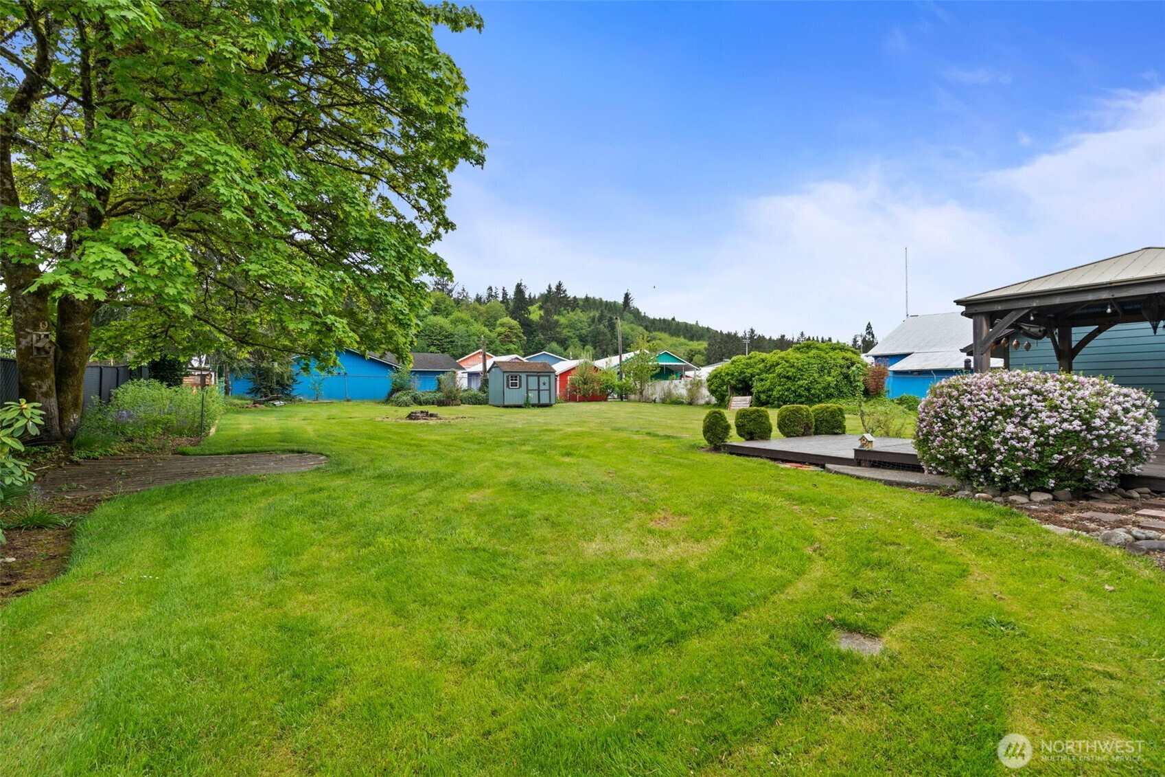 998 SR 6 Raymond, WA 98577 - Photo 34 of 38 a view of backyard with house and outdoor seating