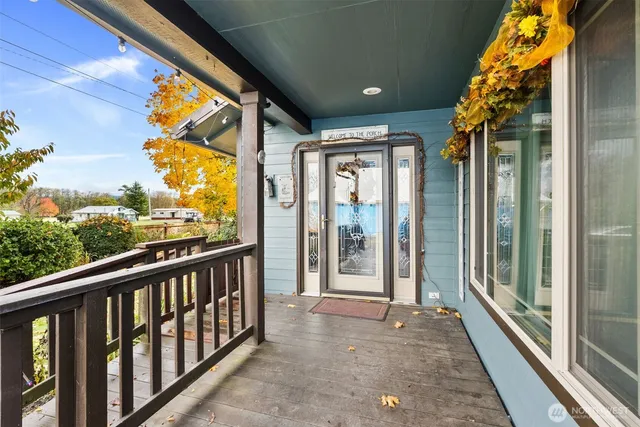 a view of porch with a door
