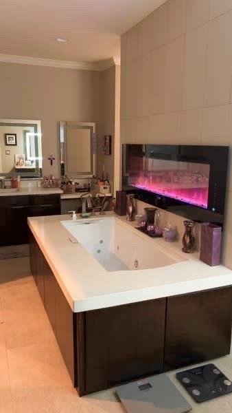 3707 Sumner Court Sherman, TX 75090 - Photo 18 of 34 a bathroom with a sink and a mirror