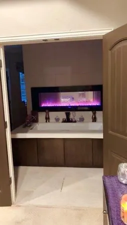 a kitchen with stainless steel appliances granite countertop a sink and stove