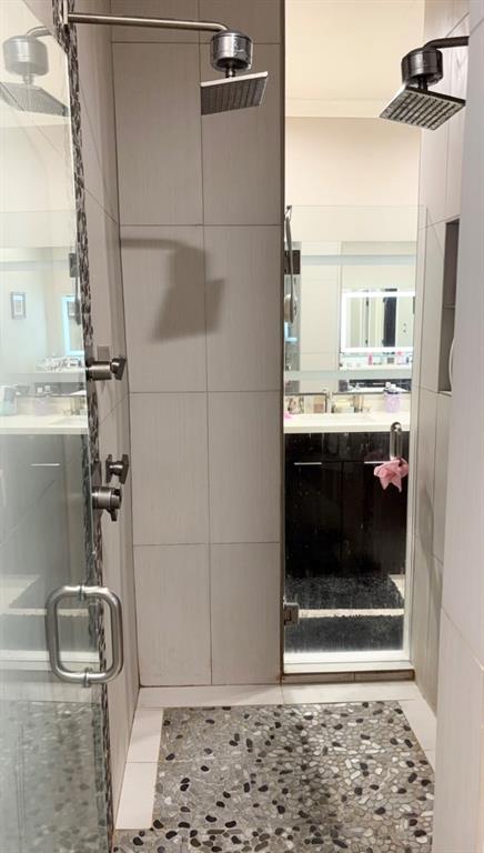 3707 Sumner Court Sherman, TX 75090 - Photo 25 of 34 a bathroom with a shower and a sink