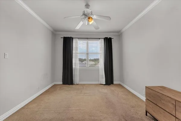 a view of a hallway with closet and entryway