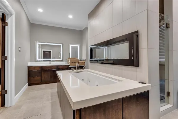 a house view with swimming pool in front of it