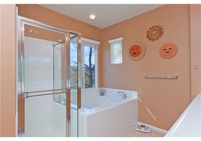 2813 Rancho Rio Chico Carlsbad, CA 92009 - Photo 12 of 23 Master Bath has separate tub and shower, spacious walk-in closet and bonus storage "room"