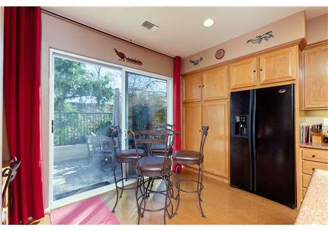 2813 Rancho Rio Chico Carlsbad, CA 92009 - Photo 7 of 23 Breakfast Nook with sliders that lead out to rear yard.