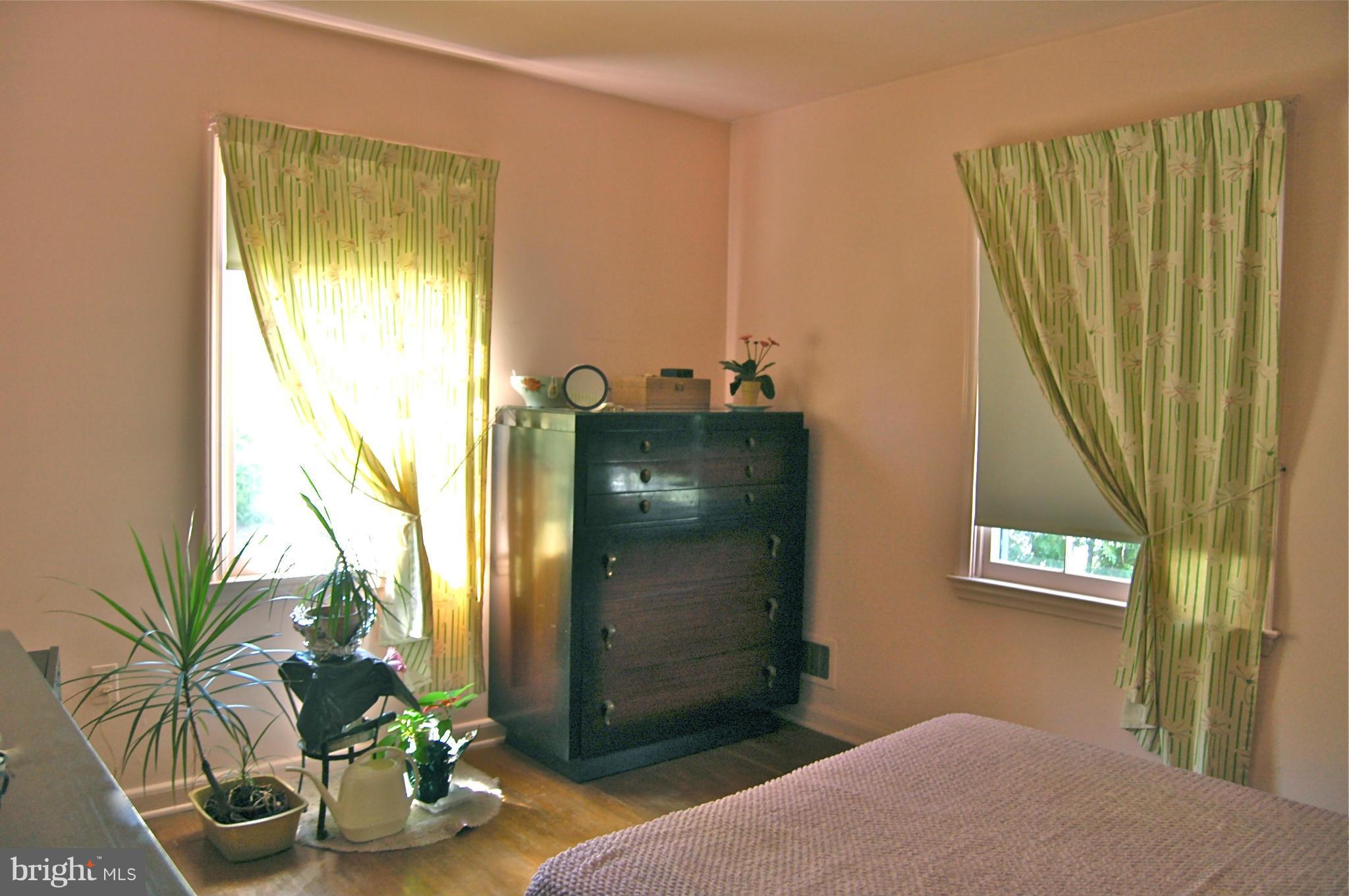 3517 Ellen Road Windsor Mill, MD 21244 - Photo 11 of 30 a room with window and flower pot