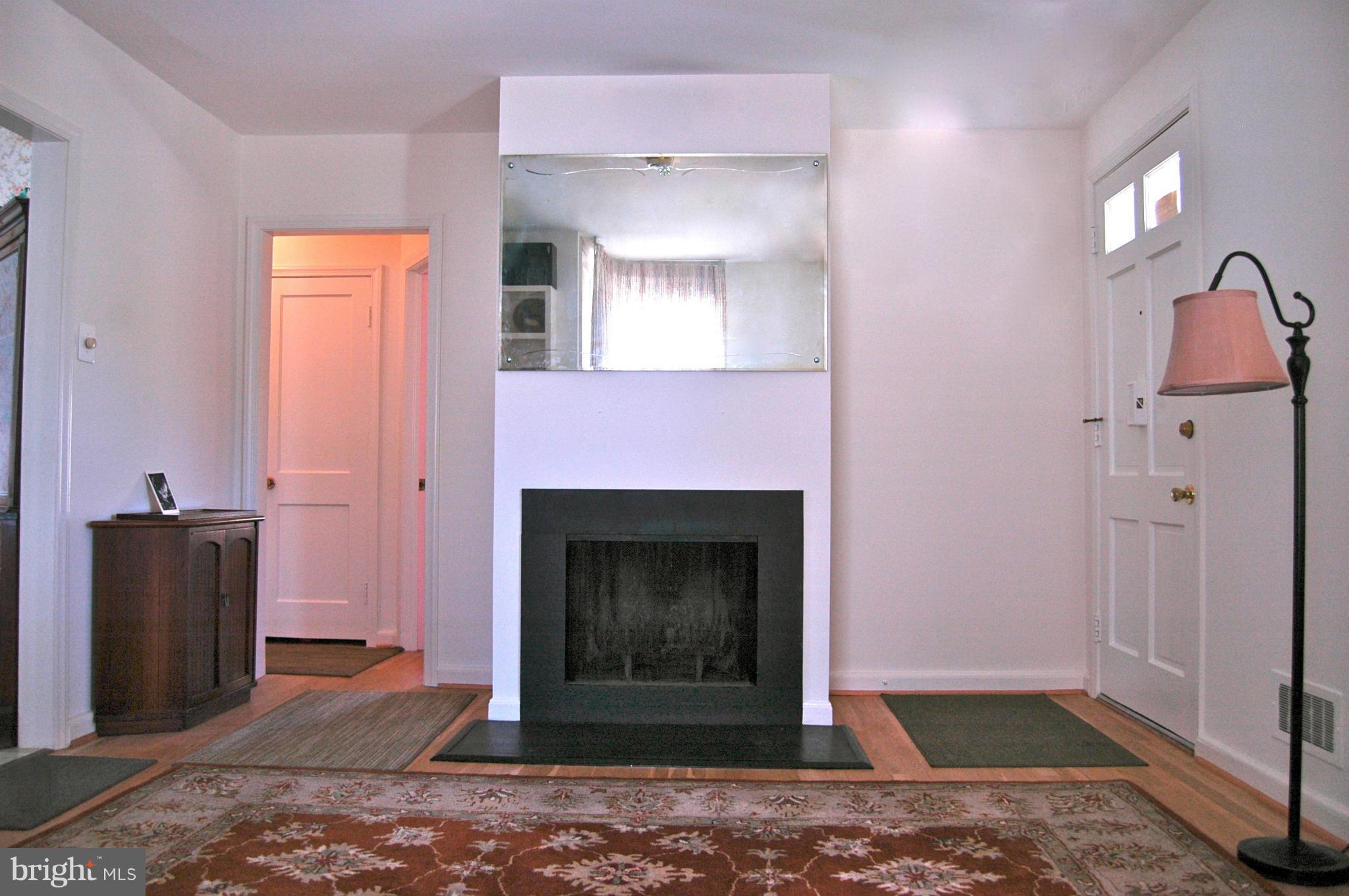 3517 Ellen Road Windsor Mill, MD 21244 - Photo 13 of 30 a living room with a fireplace
