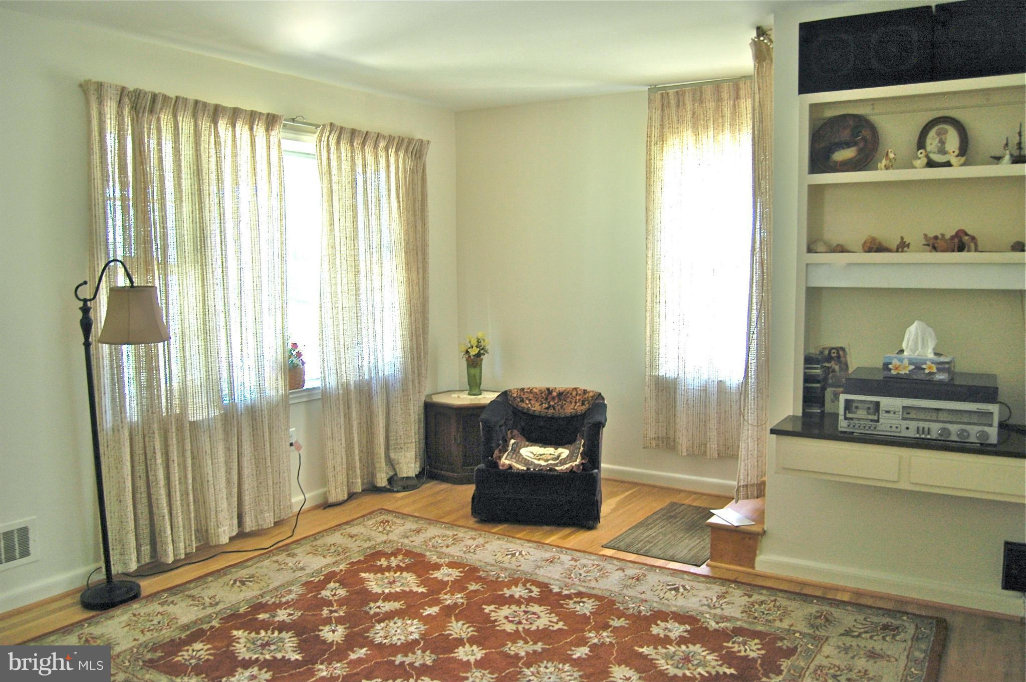 3517 Ellen Road Windsor Mill, MD 21244 - Photo 14 of 30 a view of a livingroom with wooden floor and furniture
