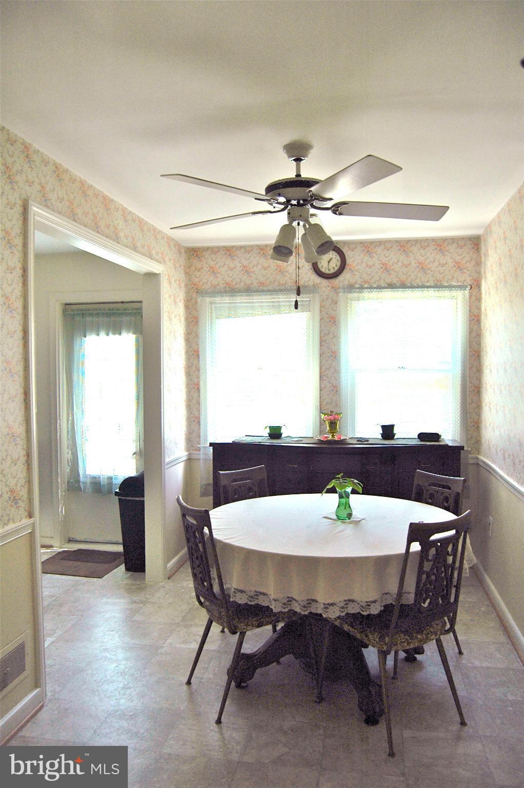 3517 Ellen Road Windsor Mill, MD 21244 - Photo 17 of 30 a view of a dining room with furniture and window