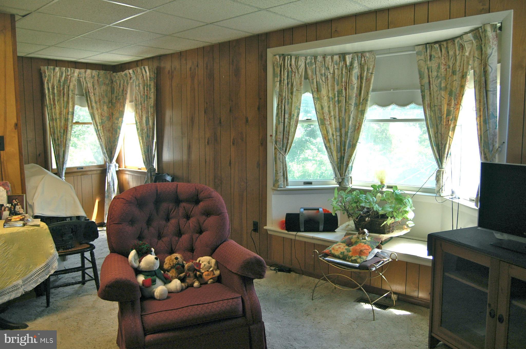 3517 Ellen Road Windsor Mill, MD 21244 - Photo 3 of 30 a living room with furniture and a large window