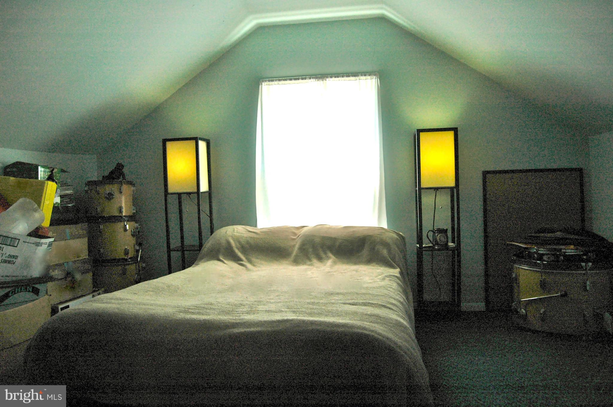 3517 Ellen Road Windsor Mill, MD 21244 - Photo 23 of 30 a bedroom with a bed and a television
