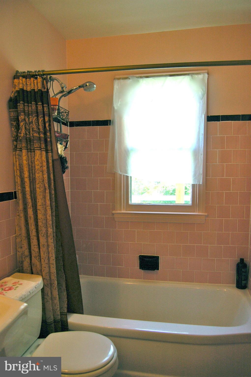 3517 Ellen Road Windsor Mill, MD 21244 - Photo 26 of 30 a bathroom with a toilet and a shower
