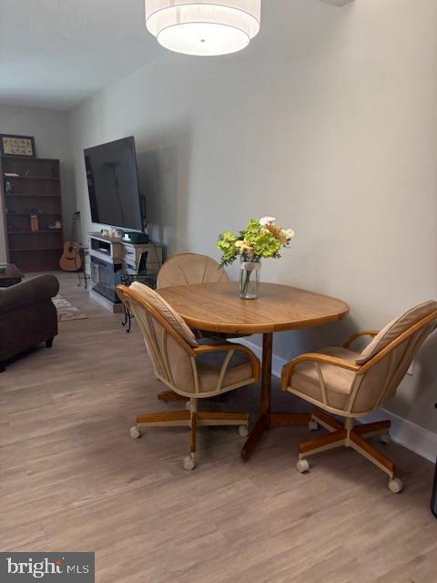 30609 Cedar Neck Road, Unit 3109 Ocean View, DE 19970 - Photo 17 of 44 a view of a dining room with furniture