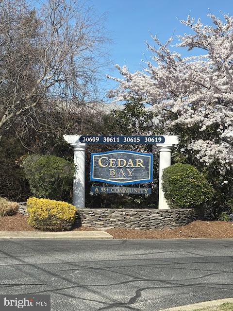 30609 Cedar Neck Road, Unit 3109 Ocean View, DE 19970 - Photo 2 of 44 a view of a street sign